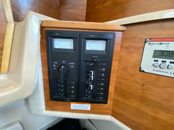  Yacht Photos Pics Electrical control panel inside a 2017 Cutwater C-28 boat cabin.