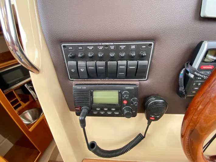  Yacht Photos Pics Control panel of a 2017 Cutwater C-28 boat with radio and switches.