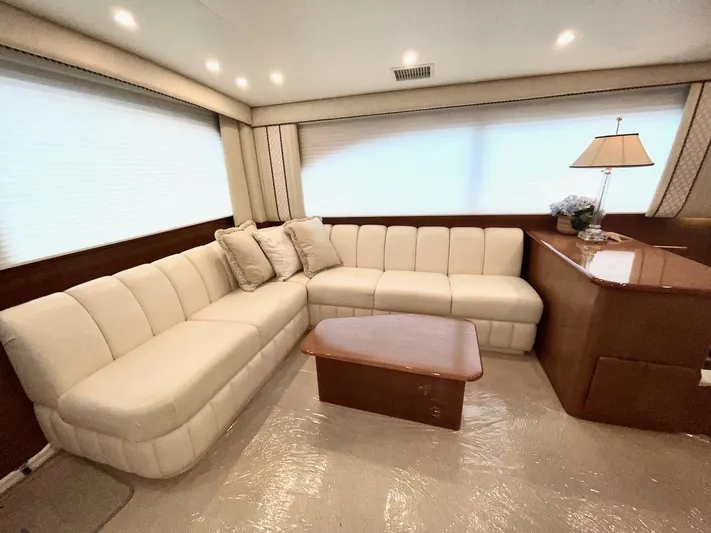 Irish Mist Yacht Photos Pics Luxurious interior of a 2001 Post 50 Convertible yacht with plush seating and elegant decor.