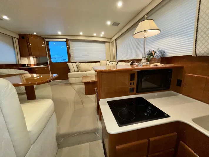 Irish Mist Yacht Photos Pics Luxurious interior of a 2001 Post 50 Convertible yacht with modern amenities.