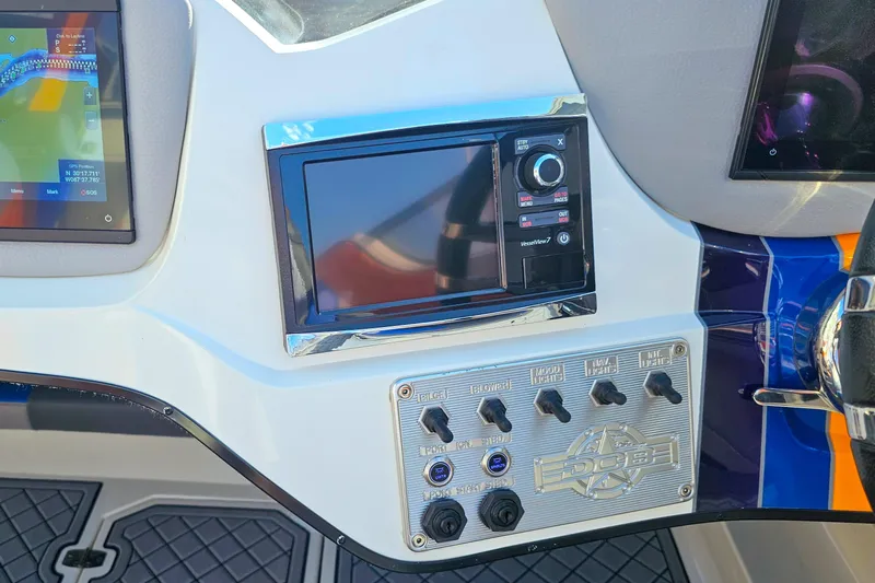  Yacht Photos Pics Dashboard of a 2010 Daves Custom Boats M35 with navigation and control panel.