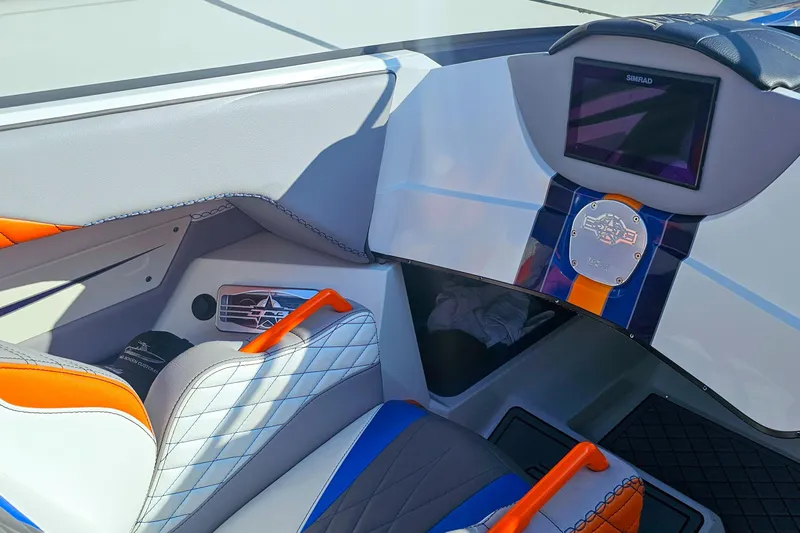  Yacht Photos Pics Interior of a 2010 Daves Custom Boats M35 with vibrant seating and modern dashboard.