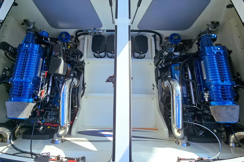  Yacht Photos Pics Engine compartment of a 2010 Daves Custom Boats M35, featuring dual high-performance engines.