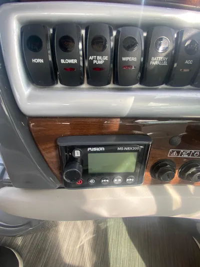 The Mint Yacht Photos Pics Control panel of 2018 Four Winns 355 Vista boat with switches and Fusion MS-NRX300.