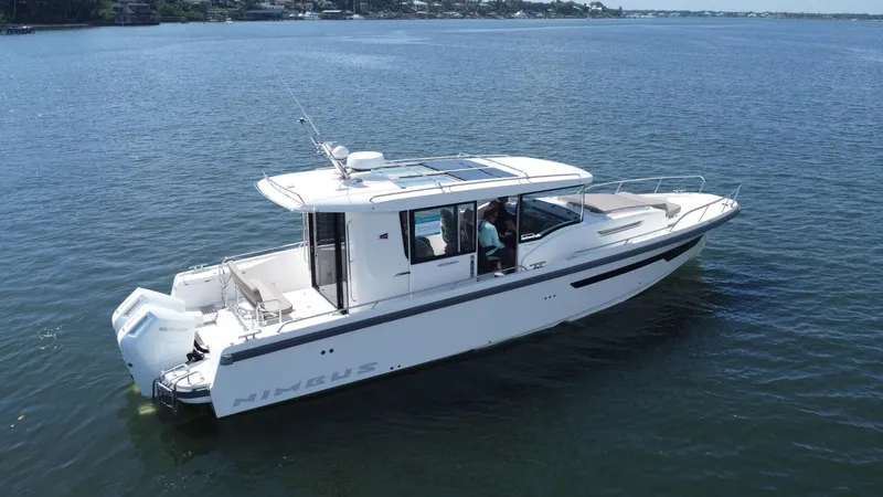 In- Stock 2025 Nimbus C11 #086 Yacht Photos Pics Nimbus Commuter 11 #086, 2025 model, cruising on a calm lake.