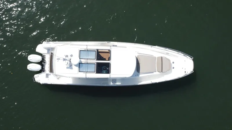 In- Stock 2025 Nimbus C11 #086 Yacht Photos Pics Aerial view of 2025 Nimbus Commuter 11 #086 boat on water.