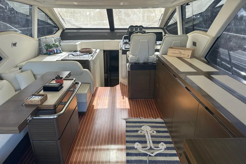 Radio Waves Yacht Photos Pics Luxurious interior of 2015 Azimut 55S yacht with elegant furnishings and modern design.