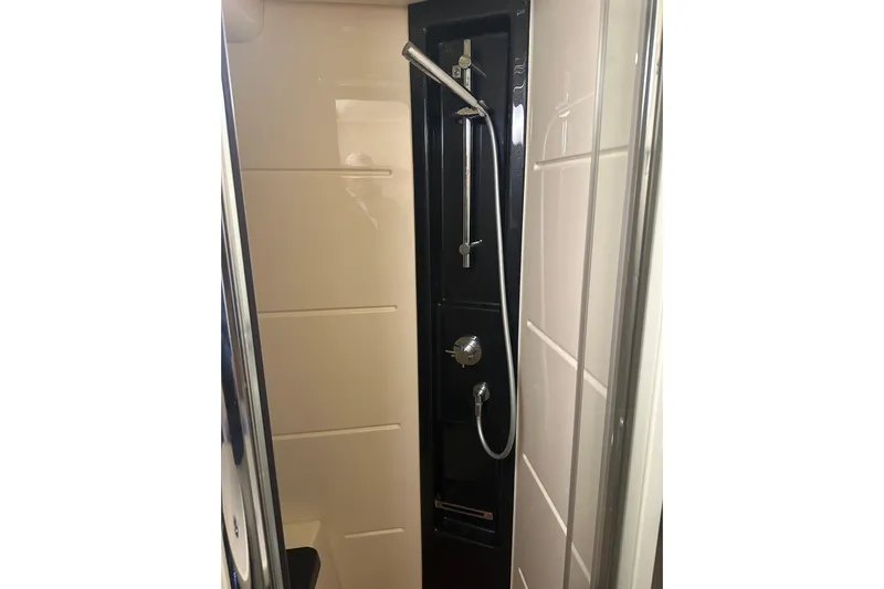 Radio Waves Yacht Photos Pics Shower area in 2015 Azimut 55S yacht, featuring sleek modern design.