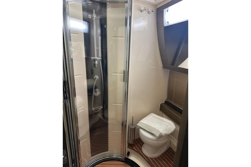 Radio Waves Yacht Photos Pics Luxurious bathroom in 2015 Azimut 55S yacht with modern shower and toilet.