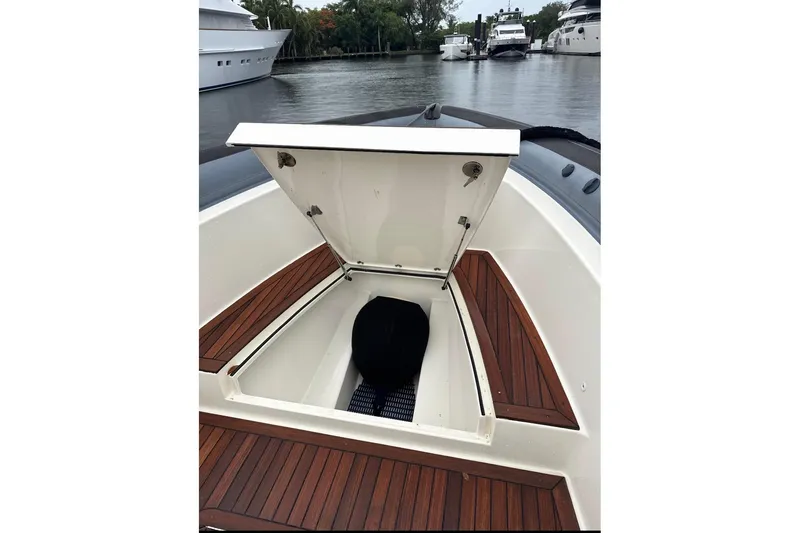  Yacht Photos Pics Open storage compartment on 2018 Ocean 1 R boat with wooden deck.