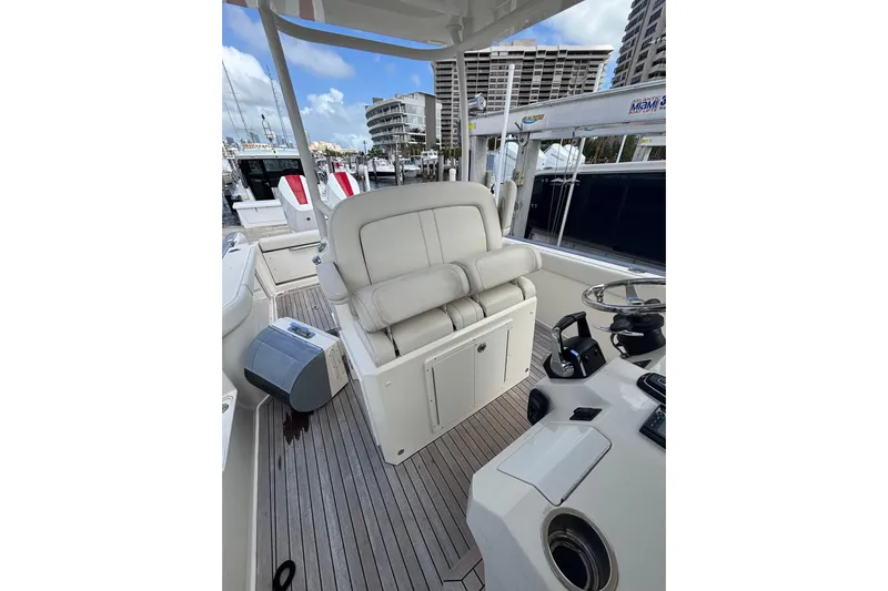  Yacht Photos Pics Luxury Ocean 1 R 2018 boat interior with white seating and modern controls.