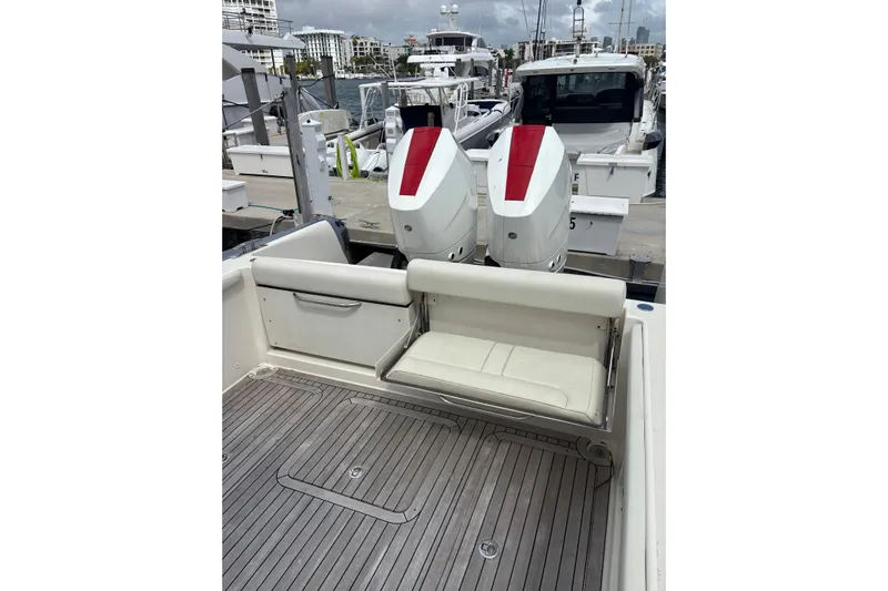  Yacht Photos Pics 2018 Ocean 1 R boat with dual engines, docked at marina.