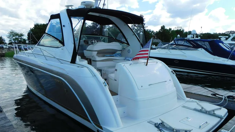  Yacht Photos Pics 2003 Formula 40 PC yacht docked, featuring sleek design and American flag.