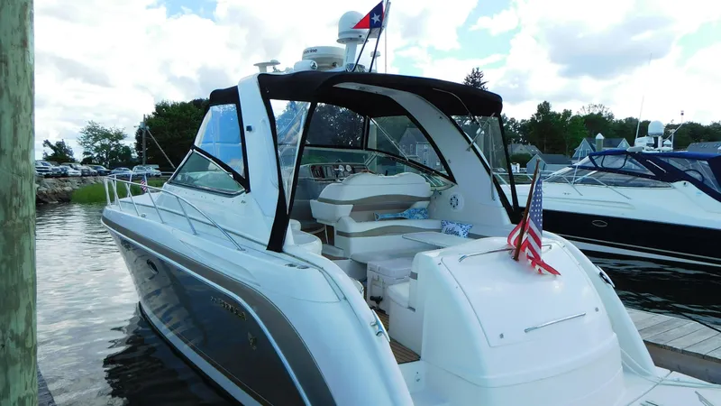  Yacht Photos Pics 2003 Formula 40 PC yacht docked, featuring sleek design and American flag.