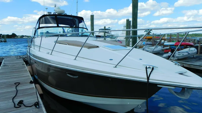  Yacht Photos Pics 2003 Formula 40 PC yacht docked at marina under blue sky.