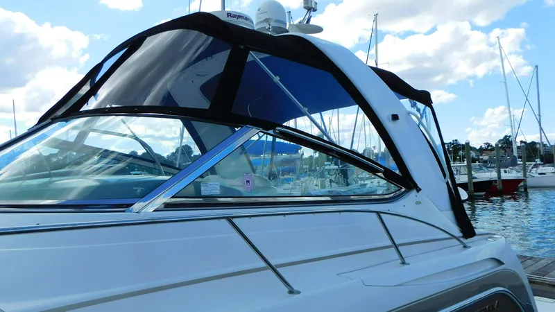  Yacht Photos Pics 2003 Formula 40 PC boat docked at marina with clear skies.