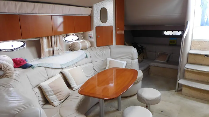  Yacht Photos Pics Luxurious interior of a 2003 Formula 40 PC yacht with plush seating and wooden accents.