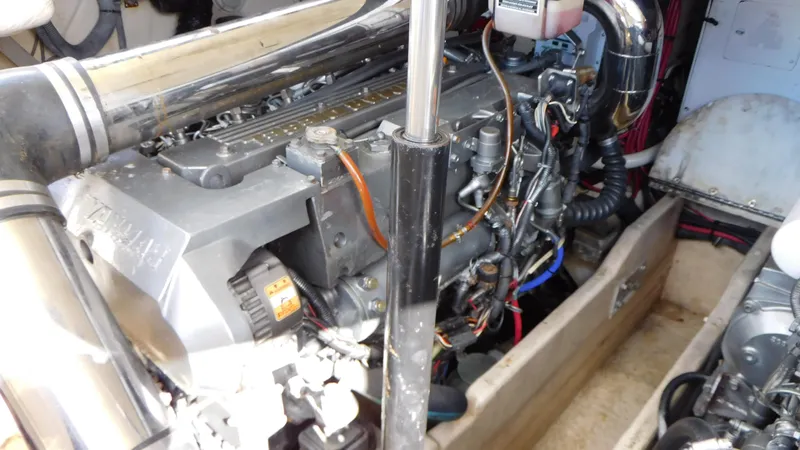  Yacht Photos Pics Engine compartment of a 2003 Formula 40 PC boat, showcasing detailed mechanical components.