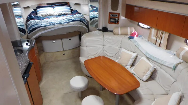  Yacht Photos Pics Luxurious interior of a 2003 Formula 40 PC yacht with cozy seating and elegant decor.