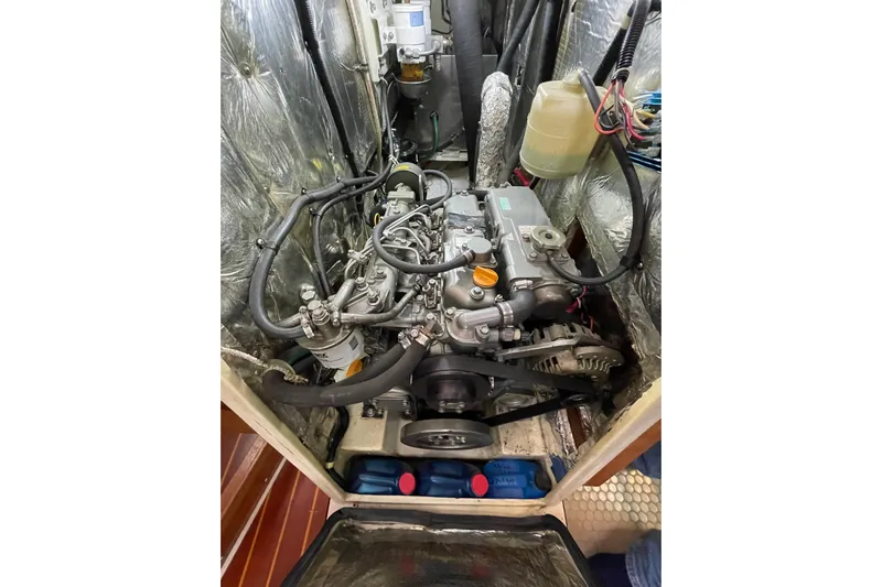 Buena Vida Yacht Photos Pics Engine compartment of a 2000 Catalina 42 MkII sailboat, showcasing detailed components.