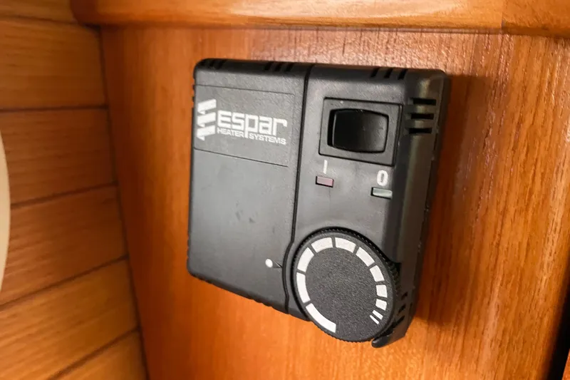 Buena Vida Yacht Photos Pics Espar heater control panel in a 2000 Catalina 42 MkII sailboat interior.