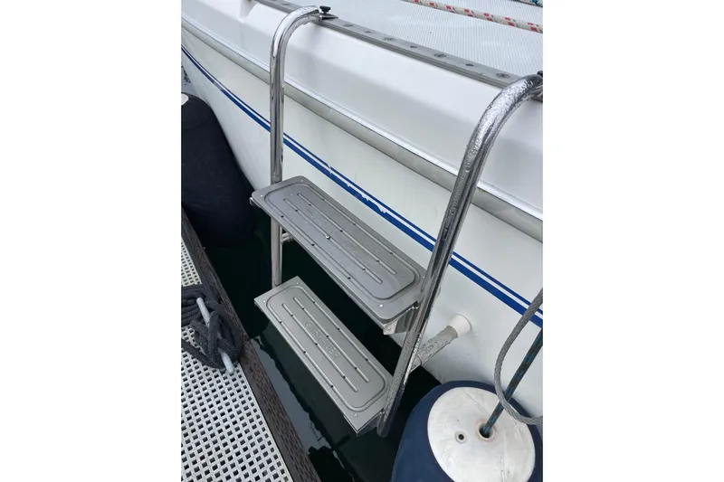 Buena Vida Yacht Photos Pics Stainless steel swim ladder on a 2000 Catalina 42 MkII sailboat.