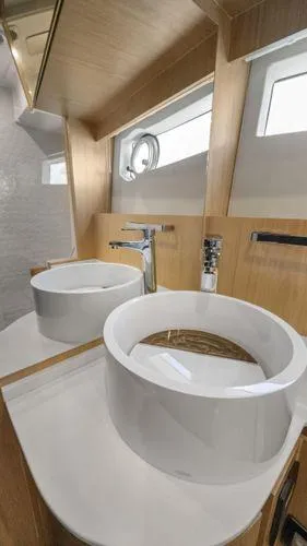  Yacht Photos Pics Modern bathroom interior on 2024 OKEAN 52 yacht with sleek sink design.