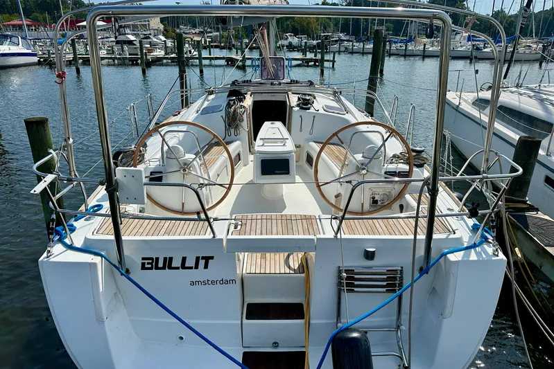  Yacht Photos Pics Beneteau Oceanis 40 sailboat, 2010 model, docked at a marina with dual steering wheels.