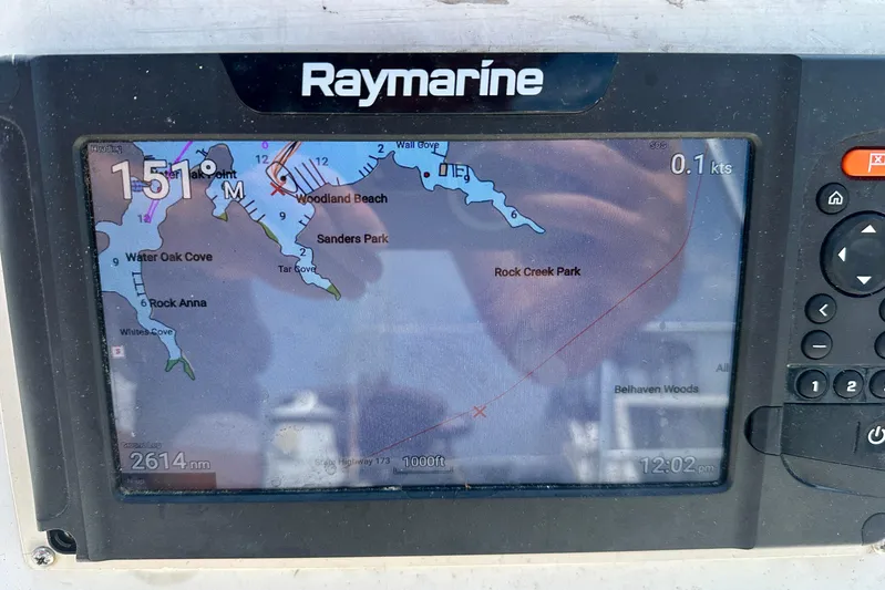  Yacht Photos Pics Raymarine navigation display on 2010 Beneteau Oceanis 40 sailboat, showing coastal map and speed.