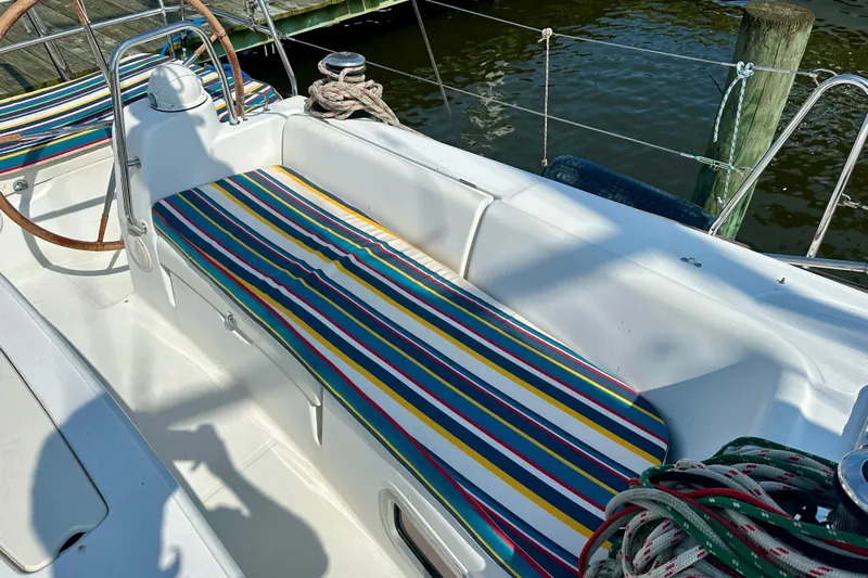  Yacht Photos Pics Colorful striped seating on 2010 Beneteau Oceanis 40 sailboat deck.