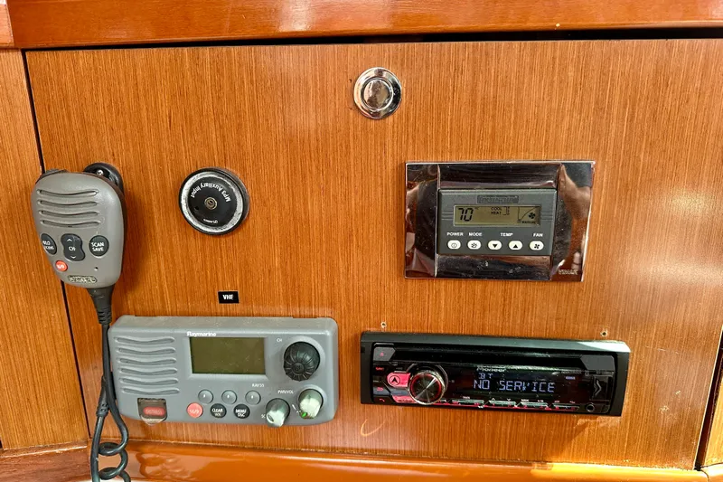  Yacht Photos Pics Control panel of a 2010 Beneteau Oceanis 40 yacht with radio and thermostat.
