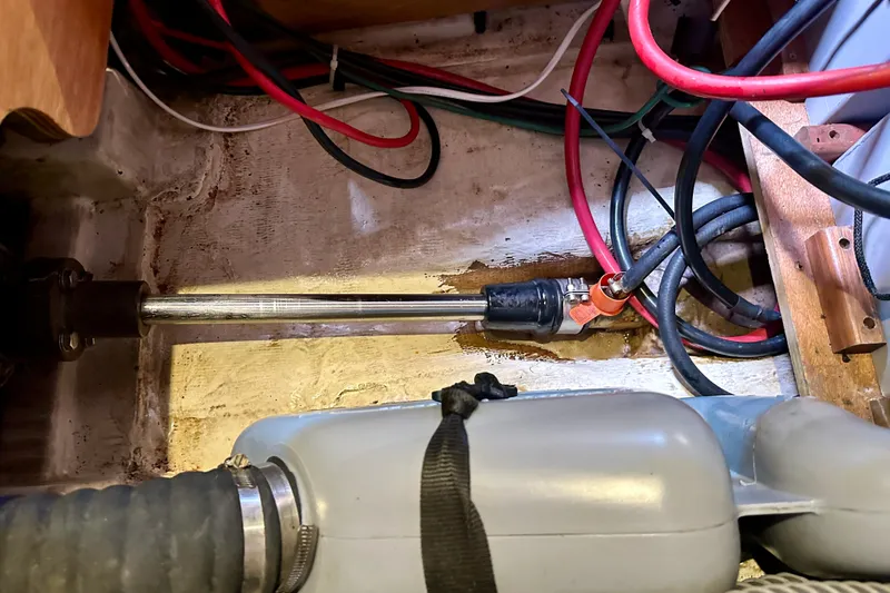  Yacht Photos Pics Engine compartment of a 2010 Beneteau Oceanis 40 sailboat, showing cables and components.