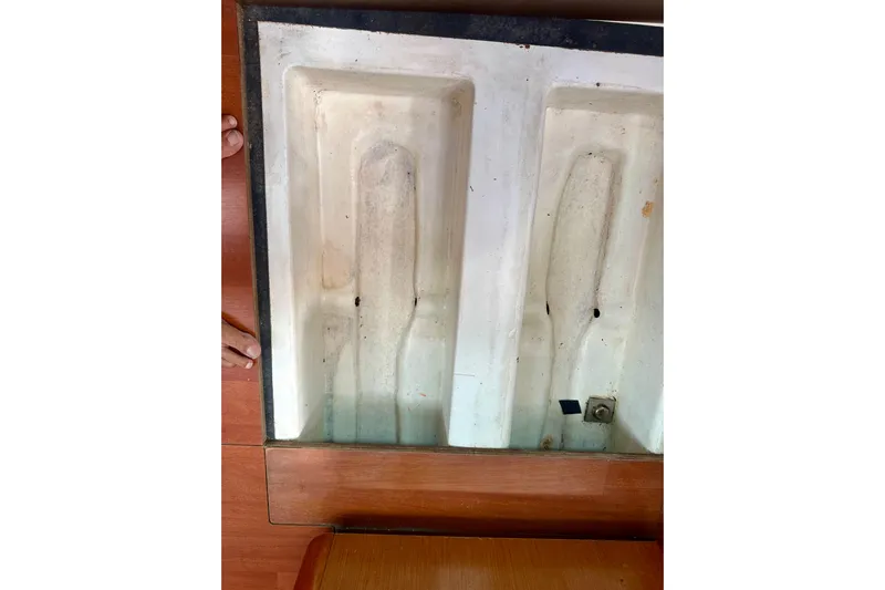  Yacht Photos Pics Interior compartment of 2010 Beneteau Oceanis 40 sailboat, showing storage space.