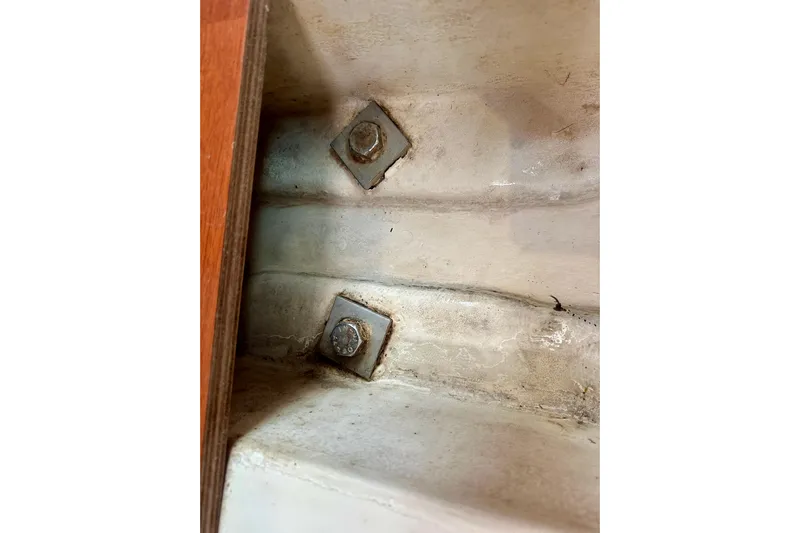  Yacht Photos Pics Close-up of bolts on a 2010 Beneteau Oceanis 40 sailboat interior.