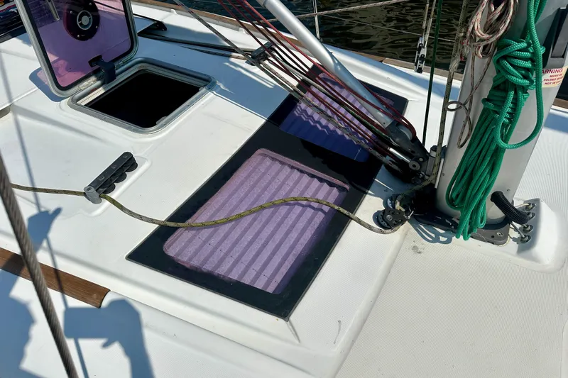  Yacht Photos Pics Deck of 2010 Beneteau Oceanis 40 sailboat with open hatch and rigging details.