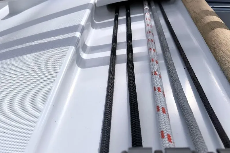  Yacht Photos Pics Close-up of ropes on a 2011 Beneteau Oceanis 40 sailboat deck.