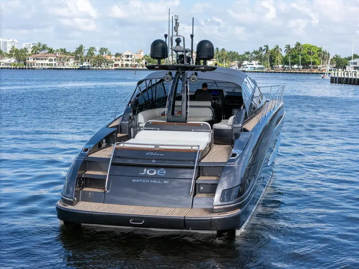 Joe Yacht Photos Pics 2015 Riva 63 Virtus luxury yacht on calm water, showcasing sleek design and elegant craftsmanship.