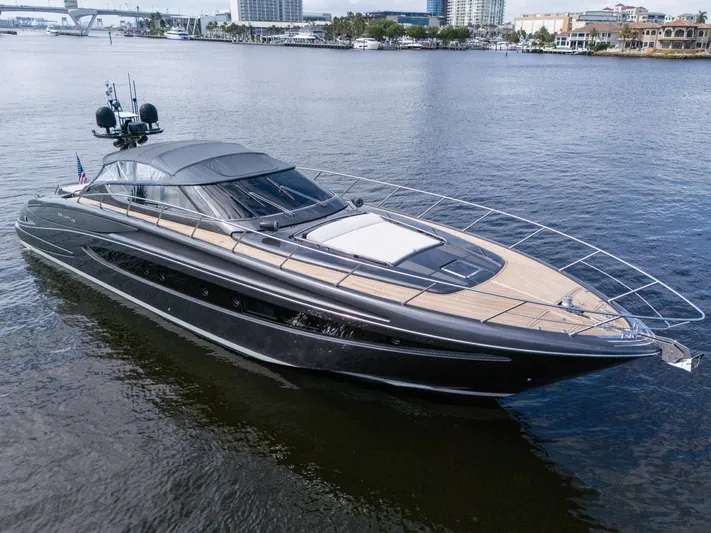 Joe Yacht Photos Pics Luxurious 2015 Riva 63 Virtus yacht cruising on calm waters.