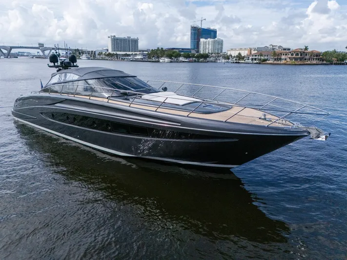 Joe Yacht Photos Pics Luxury 2015 Riva 63 Virtus yacht cruising on a calm waterway.