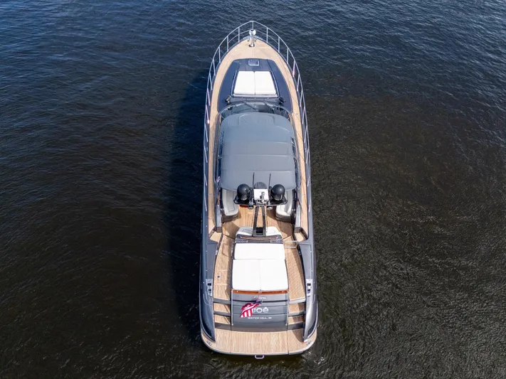 Joe Yacht Photos Pics 2015 Riva 63 Virtus yacht on open water, aerial view.