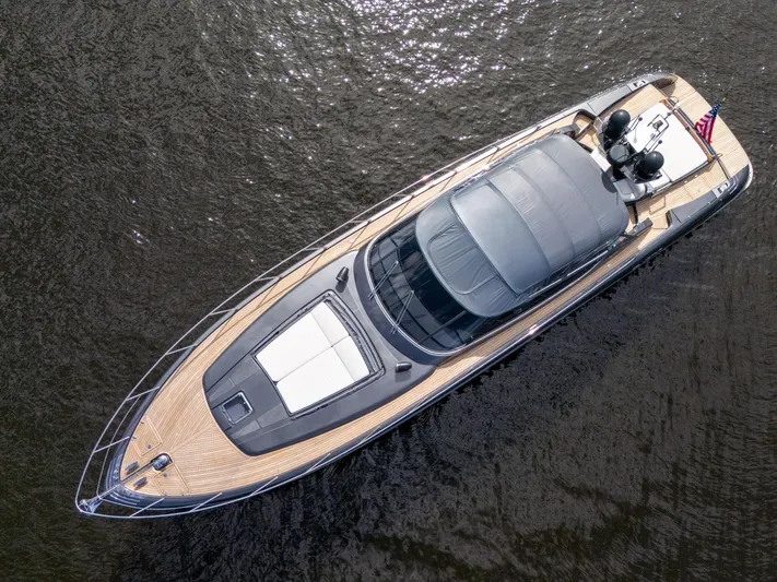 Joe Yacht Photos Pics Aerial view of a 2015 Riva 63 Virtus yacht on calm water.