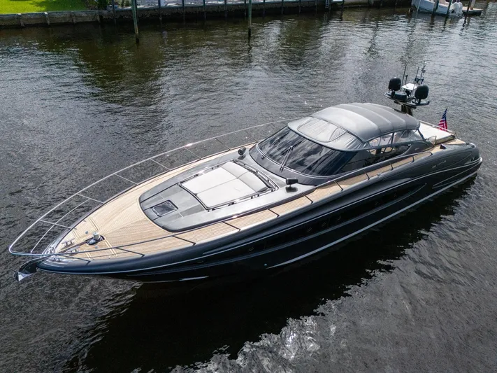 Joe Yacht Photos Pics Luxury 2015 Riva 63 Virtus yacht on calm water, showcasing sleek design and elegance.