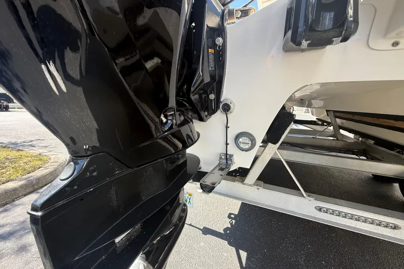  Yacht Photos Pics 2019 Calcutta 263 boat engine and trailer close-up.