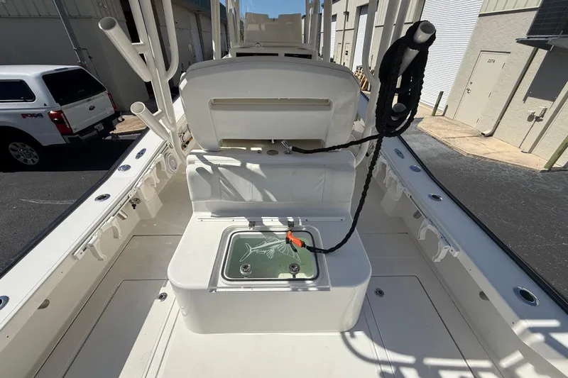  Yacht Photos Pics 2019 Calcutta 263 boat interior with fishing rod holders and storage compartment.