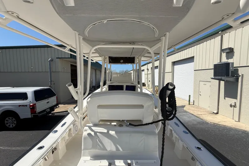  Yacht Photos Pics 2019 Calcutta 263 boat interior with T-top, parked near industrial buildings.
