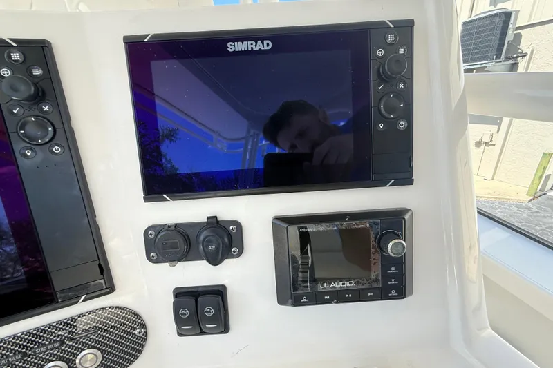  Yacht Photos Pics Boat dashboard with Simrad display and JL Audio system, Calcutta 263, 2019 model.