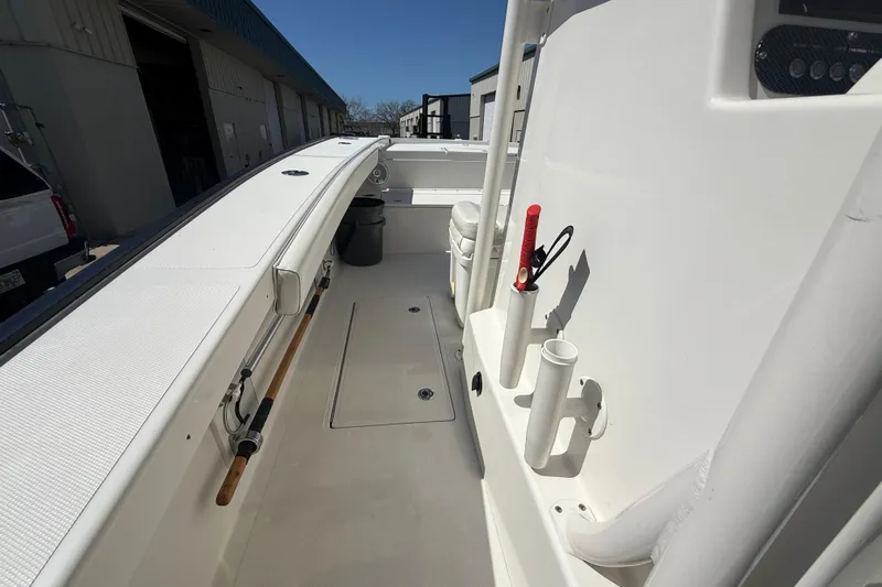  Yacht Photos Pics 2019 Calcutta 263 boat interior with rod holders and storage compartments.