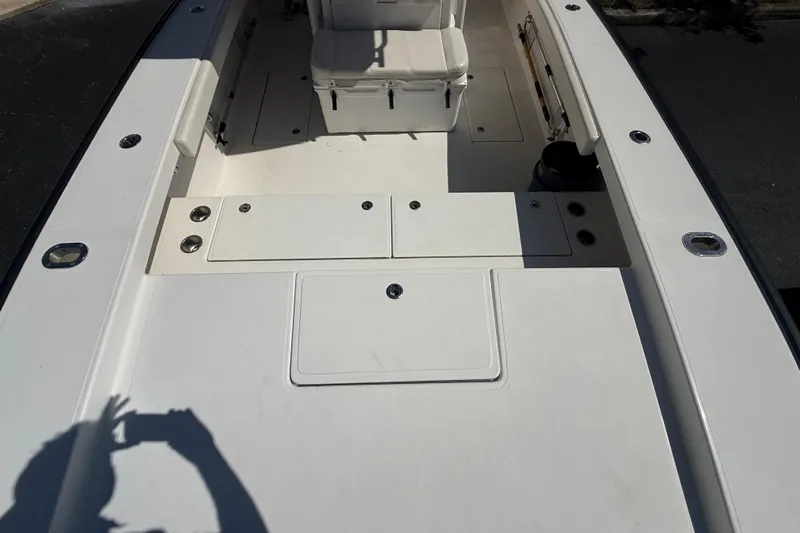  Yacht Photos Pics 2019 Calcutta 263 boat deck with seating and storage compartments.