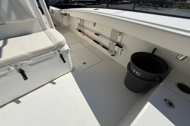  Yacht Photos Pics Spacious deck of 2019 Calcutta 263 boat with seating and Yeti bucket.
