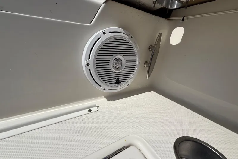  Yacht Photos Pics White speaker installed on a 2019 Calcutta 263 boat interior.